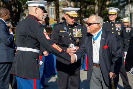 U.S. Marine Corps Sgt. Maj. Troy E. Black, the 19th Sergeant Major of the Marine Corps, greets Medal of Honor recipient Col. Harvey Barnum during a wreath laying ceremony held at the Marine Corps War Memorial, Arlington, Virginia, Nov. 10, 2021. The ceremony was held to celebrate the Marine Corps’ 246th birthday. The guest of honor was Secretary of the Navy Carlos Del Toro. (U.S. Marine Corps photo by Sgt. Victoria Ross)