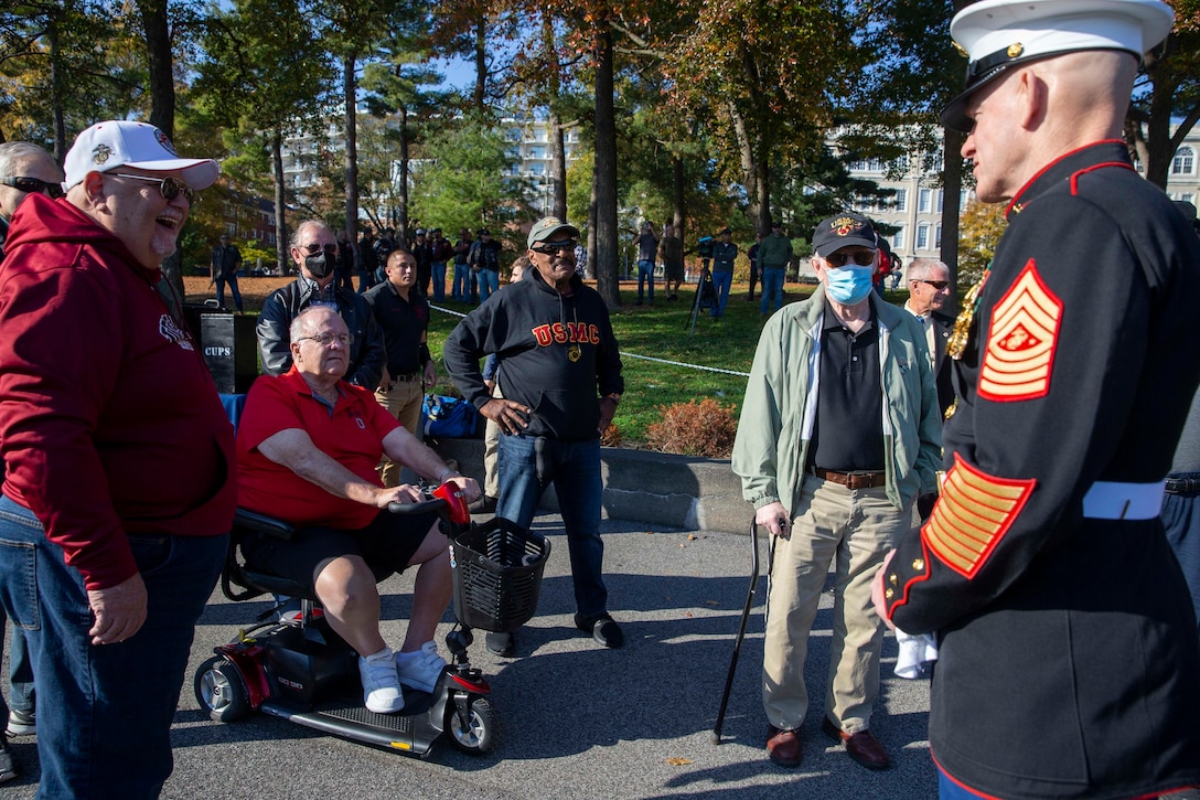 U.S. Marine Corps Sgt. Maj. Troy E. Black, the 19th Sergeant Major of the Marine Corps, greets veterans at a wreath laying ceremony held at the Marine Corps War Memorial, Arlington, Virginia, Nov. 10, 2021. The ceremony was held to celebrate the Marine Corps’ 246th birthday. The guest of honor was Secretary of the Navy Carlos Del Toro. (U.S. Marine Corps photo by Sgt. Victoria Ross)