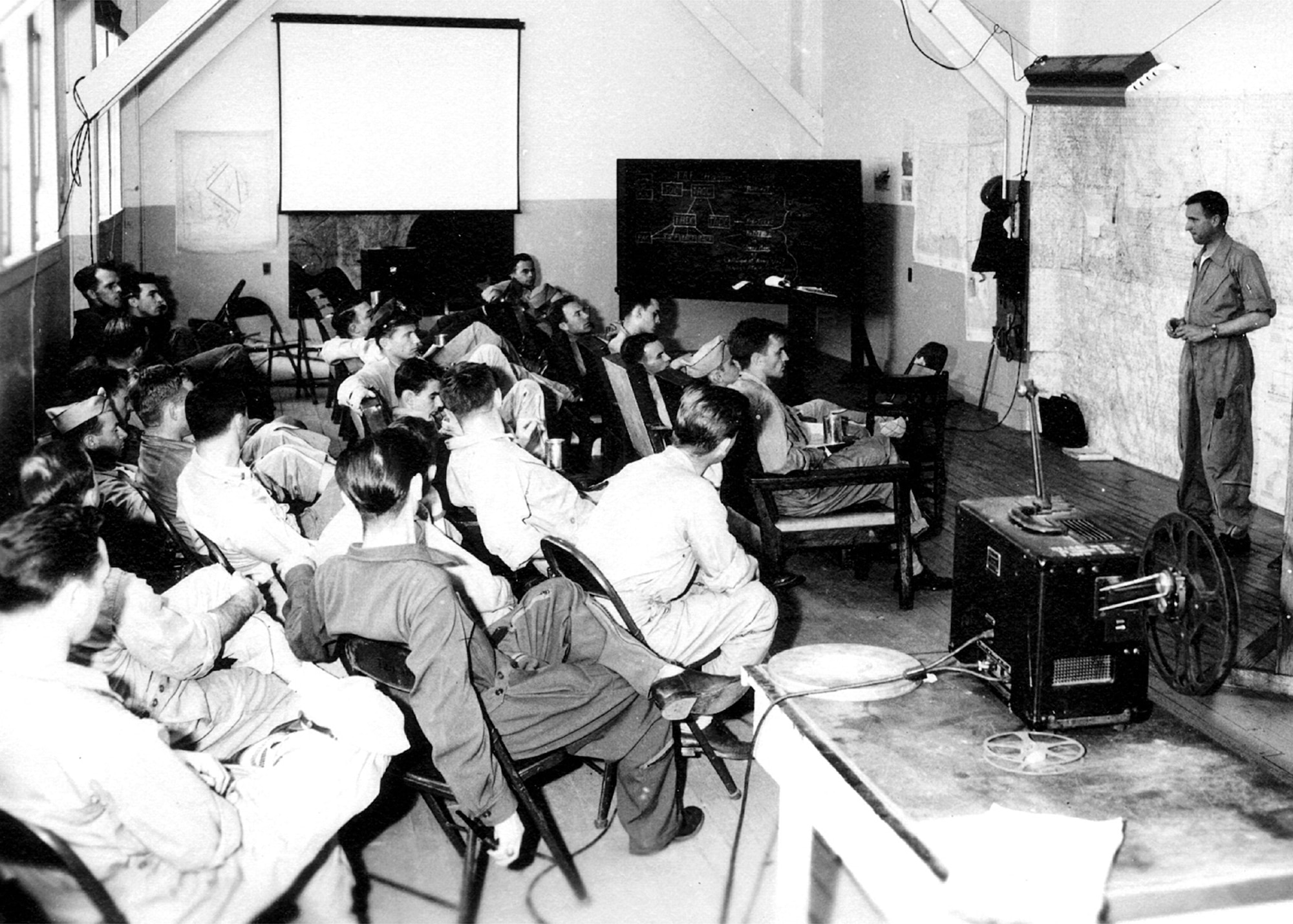 Lt.Col. Barnie McEntire conducts a briefing, late 1940s