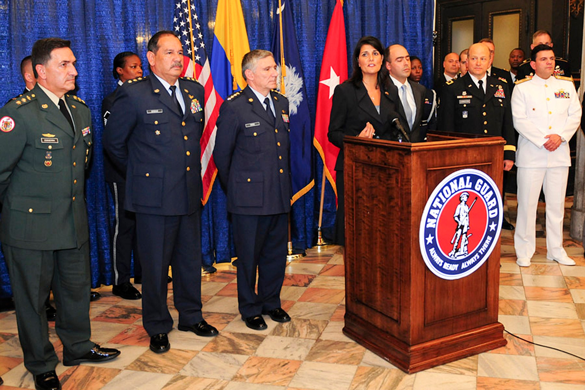 South Carolina Governor Nikki Haley and Maj. Gen. Robert E. Livingston Jr., the adjutant general for South Carolina National Guard, announce the commencement of South Carolina National Guard's state partnership with the Republic of Colombia July 23, 2012. Colombian Vice Minister of Defense Jorge Enrique Bedoya and Gov. Haley signed the partnership proclamation establishing this historic bilateral relationship prior to the press conference. (U.S. Army photo by Staff Sgt. Tracci Dorgan) RELEASED