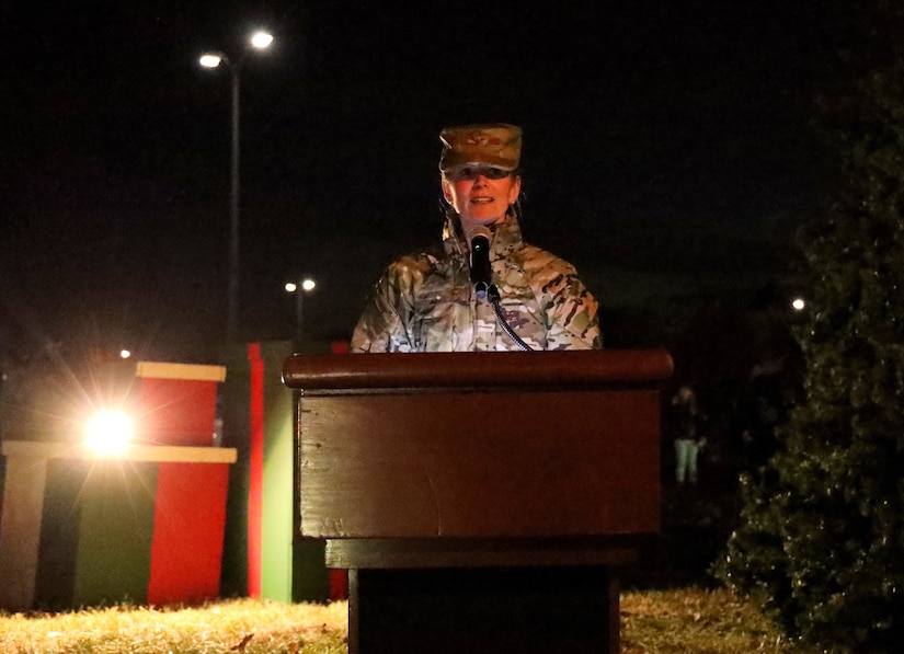 U.S. Air Force Col. Cat Logan, Joint Base Anacostia-Bolling and 11th Wing commander, gives her remarks during the annual tree lighting ceremony on Joint Base Anacostia-Bolling, Washington D.C., Dec. 3, 2021. The tree-lighting ceremony marked the beginning of the holiday season at the installation. (U.S. Air Force photo by Brian Nestor)