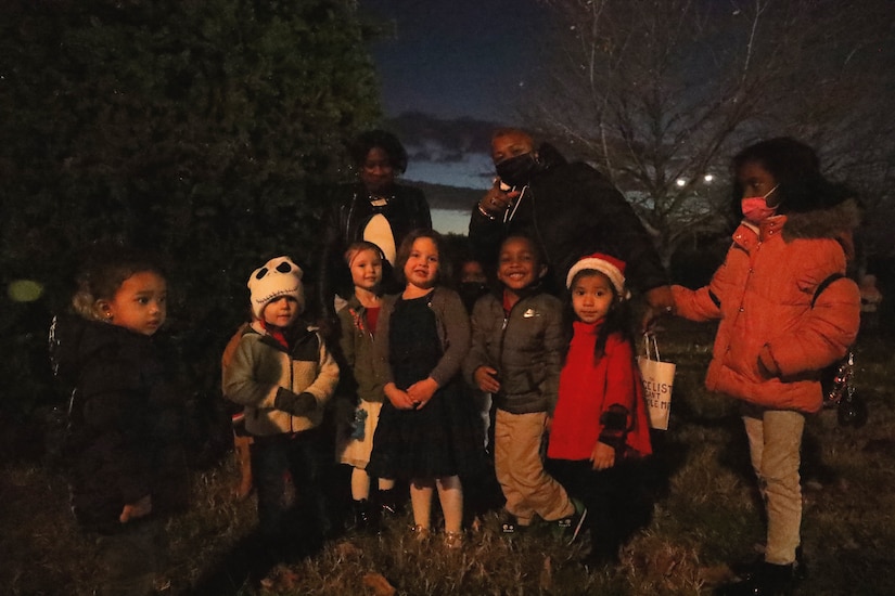 Pre-K students from LEARN D.C. sang “Twinkle Twinkle Little Star” during the annual tree lighting ceremony on Joint Base Anacostia-Bolling, Washington D.C., Dec. 3, 2021. The tree-lighting ceremony marked the beginning of the holiday season at the installation. (U.S. Air Force photo by Brian Nestor)