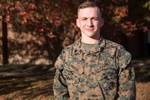 U.S. Marine Corps Cpl. Holden L. Mesimer poses for a photo at Camp Elmore, Norfolk, Virginia, 16 November, 2021. Mesimer is a Marine Air-Ground Task Force Planning specialist for Plans, Policies and Operations South. (U.S. Marine Corps photo by Lance Cpl. Jack Chen)