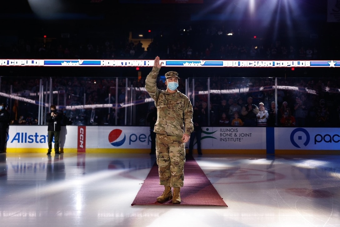 Chicago Wolves, American Hockey League team, honors U.S. Army Reserve Staff Sgt. Richard A. Copulos, of the 85th U.S. Army Reserve Support Command, during a home game versus the Rockford Icehogs at Allstate Arena, November 27, 2021, in Rosemont, Ill.