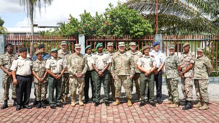 South Dakota National Guard and Suriname Defense
Force leaders stand together during a distinguished leaders visit to Paramaribo, Suriname, Nov. 24, 2021.