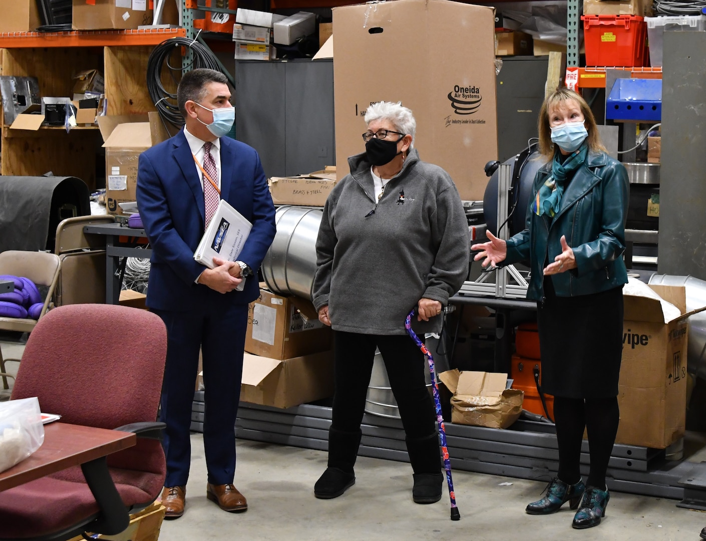 IMAGE: Mary Katherine Greenlaw (right), mayor of Fredericksburg, Va., asks a question during a visit to the Naval Surface Warfare Center Dahlgren Division laser lab as part of a tour with local elected officials. During their visit, the local officials received a briefing on multiple program areas and visited the Digital Warfare Innovation Center Lab and the laser lab.