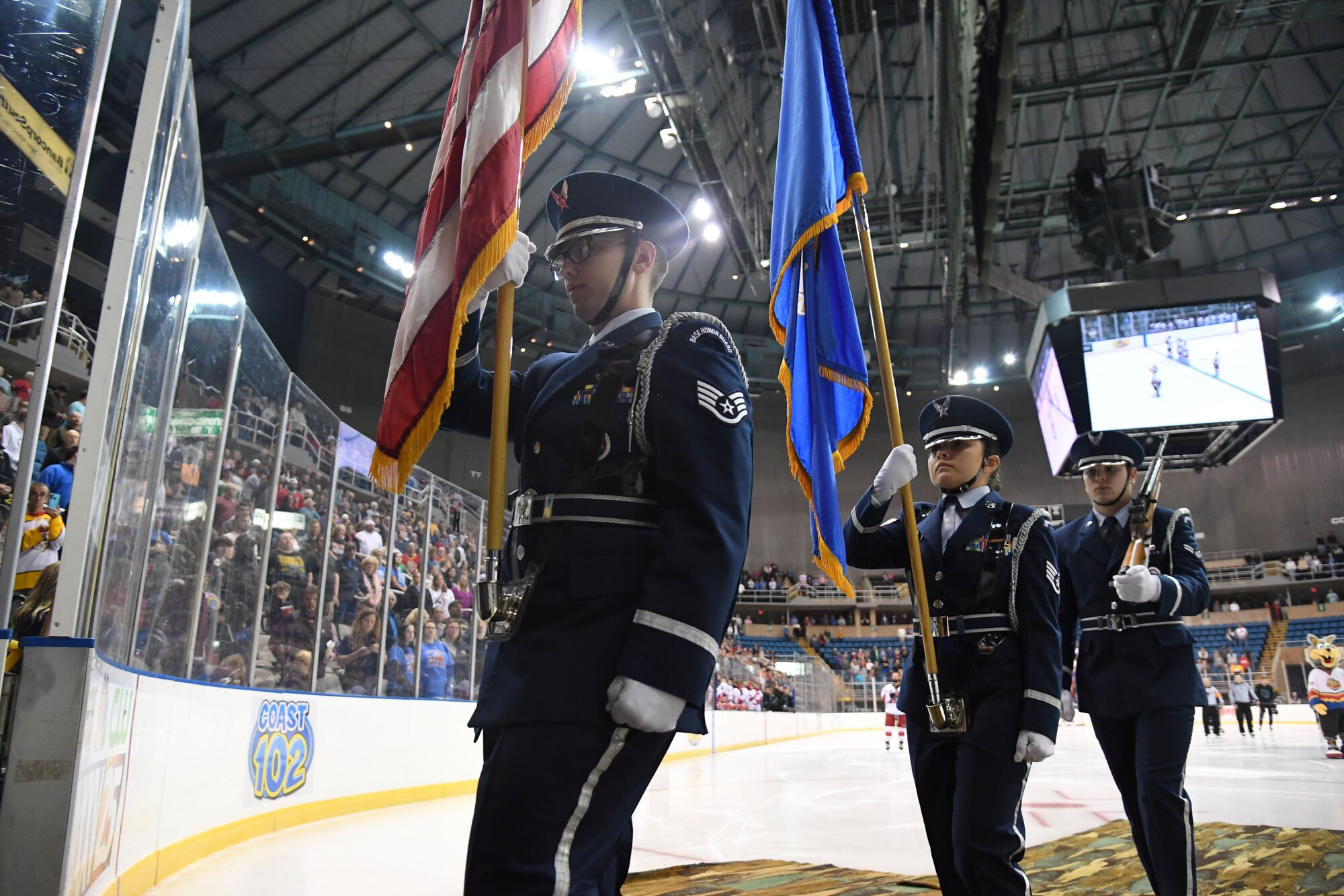 Keesler Air Force Base Honor Guard members exit the ice rink during the Biloxi Pro Hockey game inside the Mississippi Coast Coliseum at Biloxi, Mississippi, Dec. 2, 2021. Leadership from Second Air Force and the 81st Training Wing also participated in pre-game festivities. (U.S. Air Force photo by Kemberly Groue)