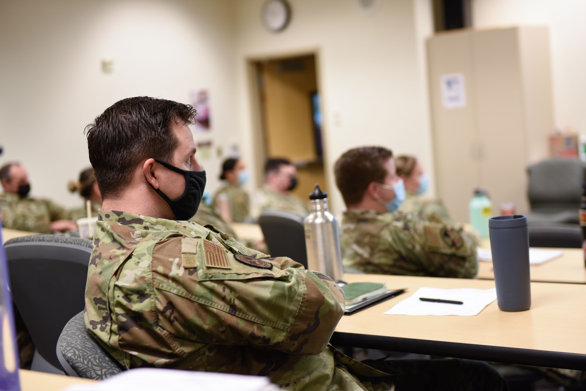 Aspiring first sergeants attend a First Sergeant Symposium, led by First Sergeant Academy instructor Senior Master Sgt. Jeremiah D. Bybee, in the education center at the at Fairchild Air Force Base, Washington, Nov. 30, 2021. Having instructors from the First Sergeant Academy visit Fairchild not only provides its Airmen insight and mentorship for career growth, it also ensures Team Fairchild has the tools it needs to continue taking care of Airmen and their families.
 (U.S. Air Force photo by Airman Jenna A. Bond)