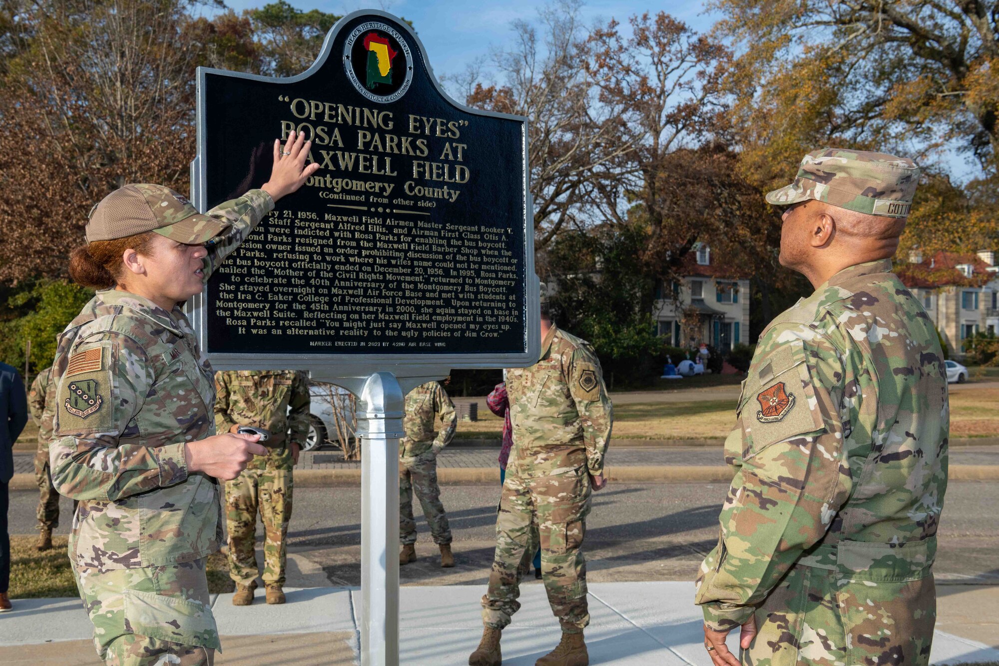 Gen. Anthony J. Cotton, Commander, Air Force Global Strike Command and Commander, Air Forces Strategic-Air, U.S. Strategic Command, meets with Col. Eries Mentzer, Commander, 42d Air Base Wing and sculptor Ian Mangum to tour the Rosa Parks memorial on Magnolia Boulevard, Dec. 3, 2021. (US Air Force photo by Melanie Rodgers Cox)