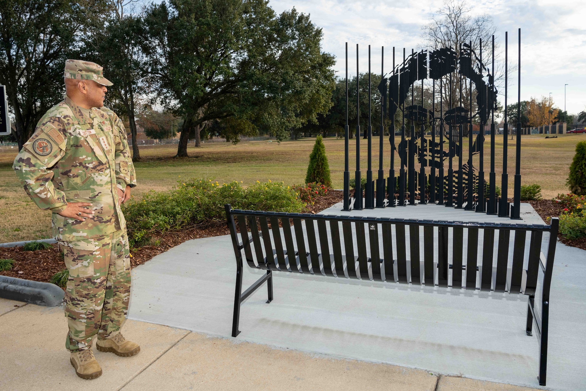 Gen. Anthony J. Cotton, Commander, Air Force Global Strike Command and Commander, Air Forces Strategic-Air, U.S. Strategic Command, meets with 42d Air Base Wing Commander Col. Eries Mentzer and sculptor Ian Mangum to tour the Rosa Parks memorial on Magnolia Boulevard, Dec. 3, 2021. (US Air Force photo by Melanie Rodgers Cox)