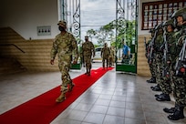U.S. Army South Commanding General, Maj. Gen. William Thigpen, enters the 5th Light Infantry Battalion for the opening ceremony of Southern Vanguard 22 in Lorena, Brazil, Dec. 6 2021. Southern Vanguard 22 was planned as a 10-day air assault operation and was the largest deployment of a U.S. Army unit to train with the Brazilian army forces in Brazil. (U.S Army photo by Pfc. Joshua Taeckens)