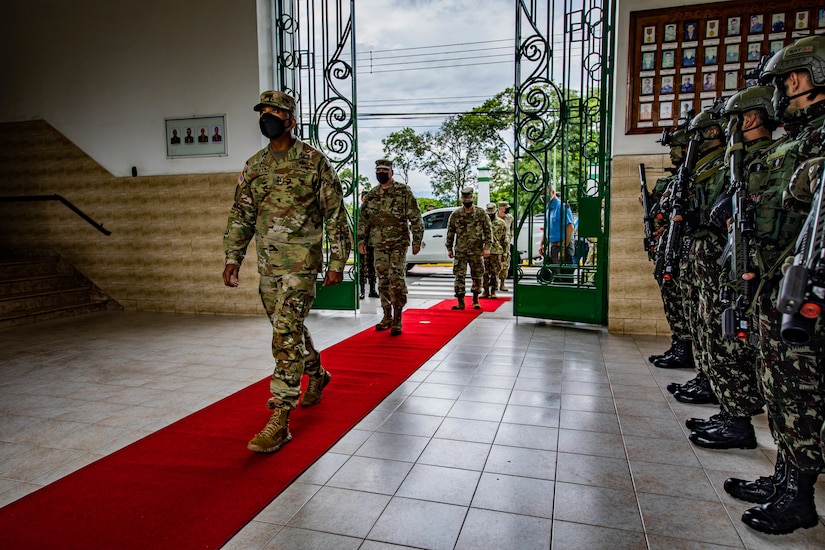 U.S. Army South Commanding General, Maj. Gen. William Thigpen, enters the 5th Light Infantry Battalion for the opening ceremony of Southern Vanguard 22 in Lorena, Brazil, Dec. 6 2021. Southern Vanguard 22 was planned as a 10-day air assault operation and was the largest deployment of a U.S. Army unit to train with the Brazilian army forces in Brazil. (U.S Army photo by Pfc. Joshua Taeckens)