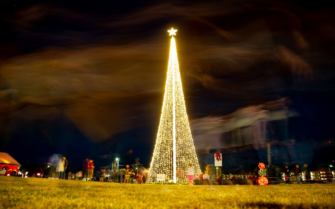 Marine Corps Air Station (MCAS) Cherry Point’s Christmas tree shines bright after the annual tree lighting ceremony at Marine Corps Air Station Cherry Point, North Carolina, Dec. 3, 2021. This event featured live music from the 2nd Marine Aircraft Wing Band, a holiday selfie station, and free cookies and hot cocoa. (U.S. Marine Corps photo by Lance Cpl. Jacob Bertram)