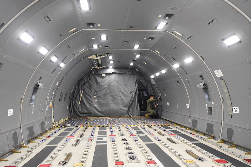 U.S. Air Force Capt. Andrew Kim, 2nd Air Refueling Squadron pilot, prepares a KC-46 Pegasus aircraft for its first mission on Joint Base McGuire-Dix-Lakehurst, New Jersey Dec. 2, 2021. Less than a month after being in the 305th and 514th Air Mobility Wings’ control, the first two KC-46 aircrafts assigned here were tasked with their first mission to test the operation and maintenance processes put in place prior to the aircrafts arrival. (U.S. Air Force photo by Senior Airman Ariel Owings)