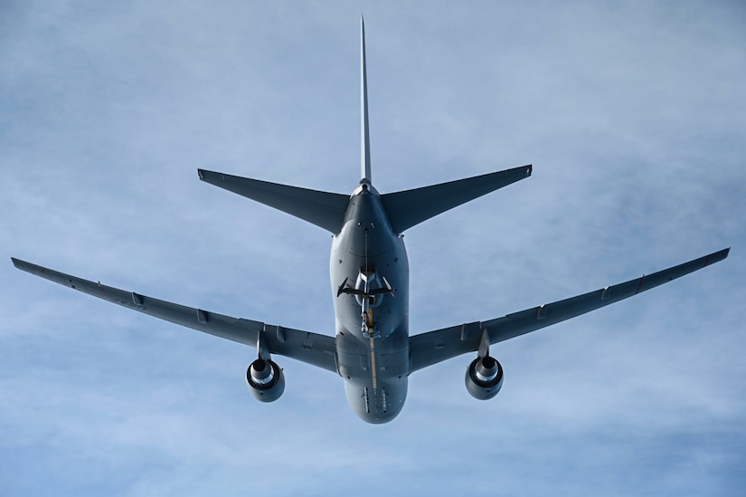 A KC-46 Pegasus assigned to Joint Base McGuire-Dix-Lakehurst, New Jersey prepares for air refueling during the first mission over the North Atlantic Ocean, Dec. 2, 2021. The KC-46 maintains air refueling edge through the use of both the refueling boom and drogue systems, allowing for simultaneous air refueling of multiple aircraft with wing pods. The KC-46 is designed to refuel allied and coalition aircraft and provide multifunctional support, like passenger and cargo transport along with medical and humanitarian relief. (U.S. Air Force photo by Senior Airman Ariel Owings)