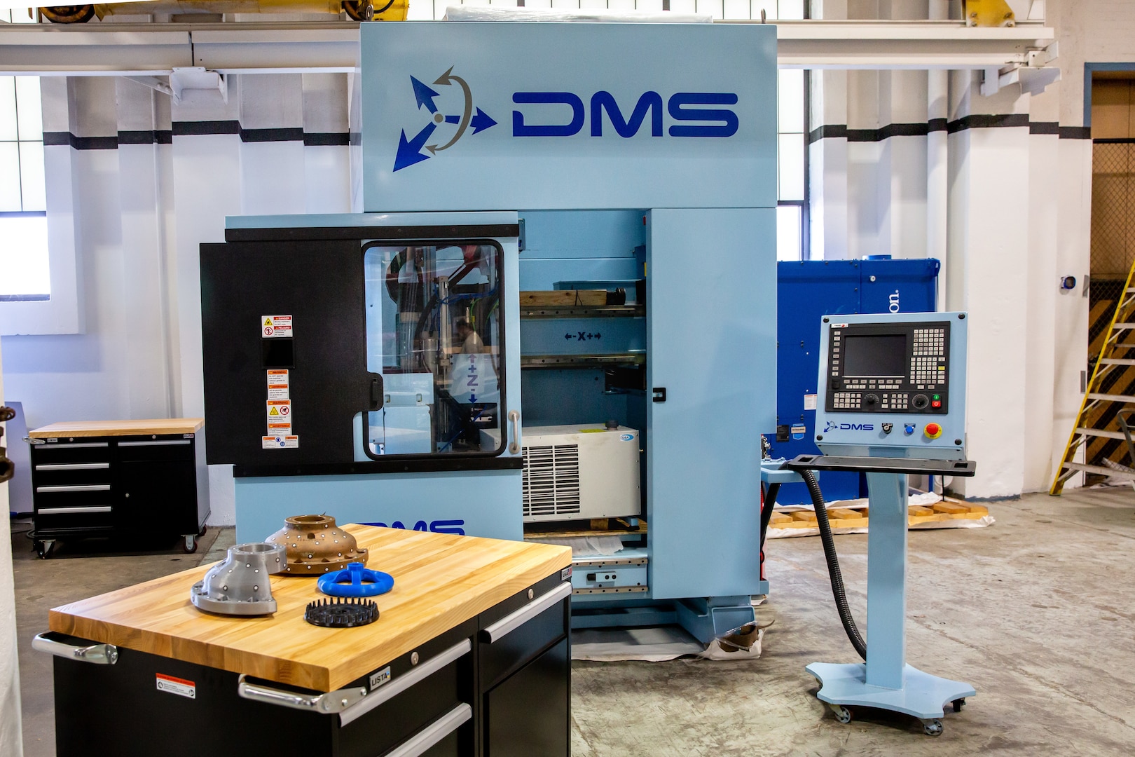 The Norfolk Naval Shipyard (NNSY) Additive Manufacturing (AM) Center of Excellence (CoE) houses 3-D metal printers that will be used to develop tools and parts in-house.