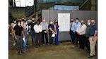 Supervisors at Norfolk Naval Shipyard’s (NNSY) Naval Foundry and Propeller Center (NFPC) detachment, Philadelphia, Pennsylvania, signed an oversized Supervisors Conduct, Standards and Expectations Contract and placed it in a central area of the shop so all employees could see and better understand the intent of the contract.