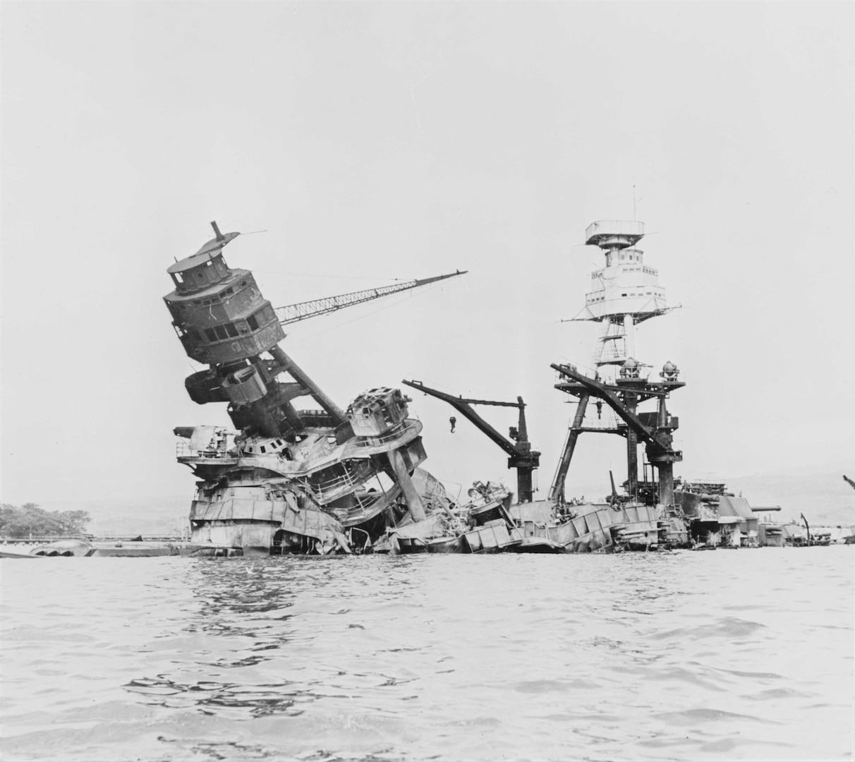 The battleship USS Arizona (BB-39), modernized at NNSY from 1929 to 1931, was destroyed during the Dec. 7, 1941 attack on Pearl Harbor.  An 1,800-pound bomb triggered a massive explosion and sunk the ship with more than 1,000 crewmembers trapped inside. This photo shows the Arizona three days after the attack.