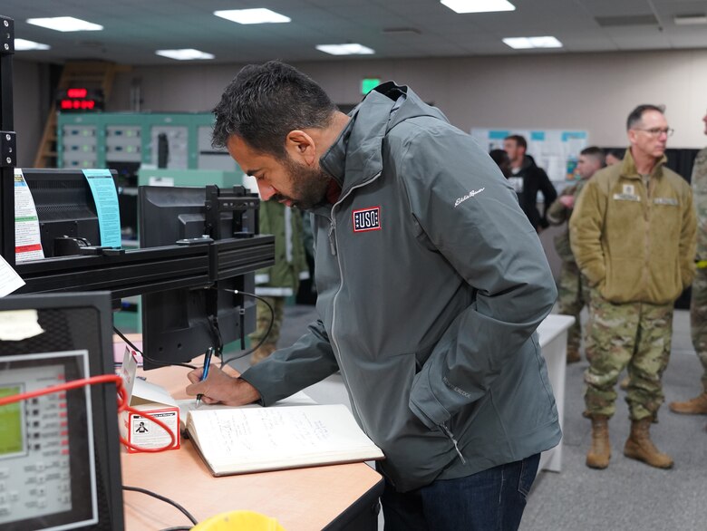Man signing book