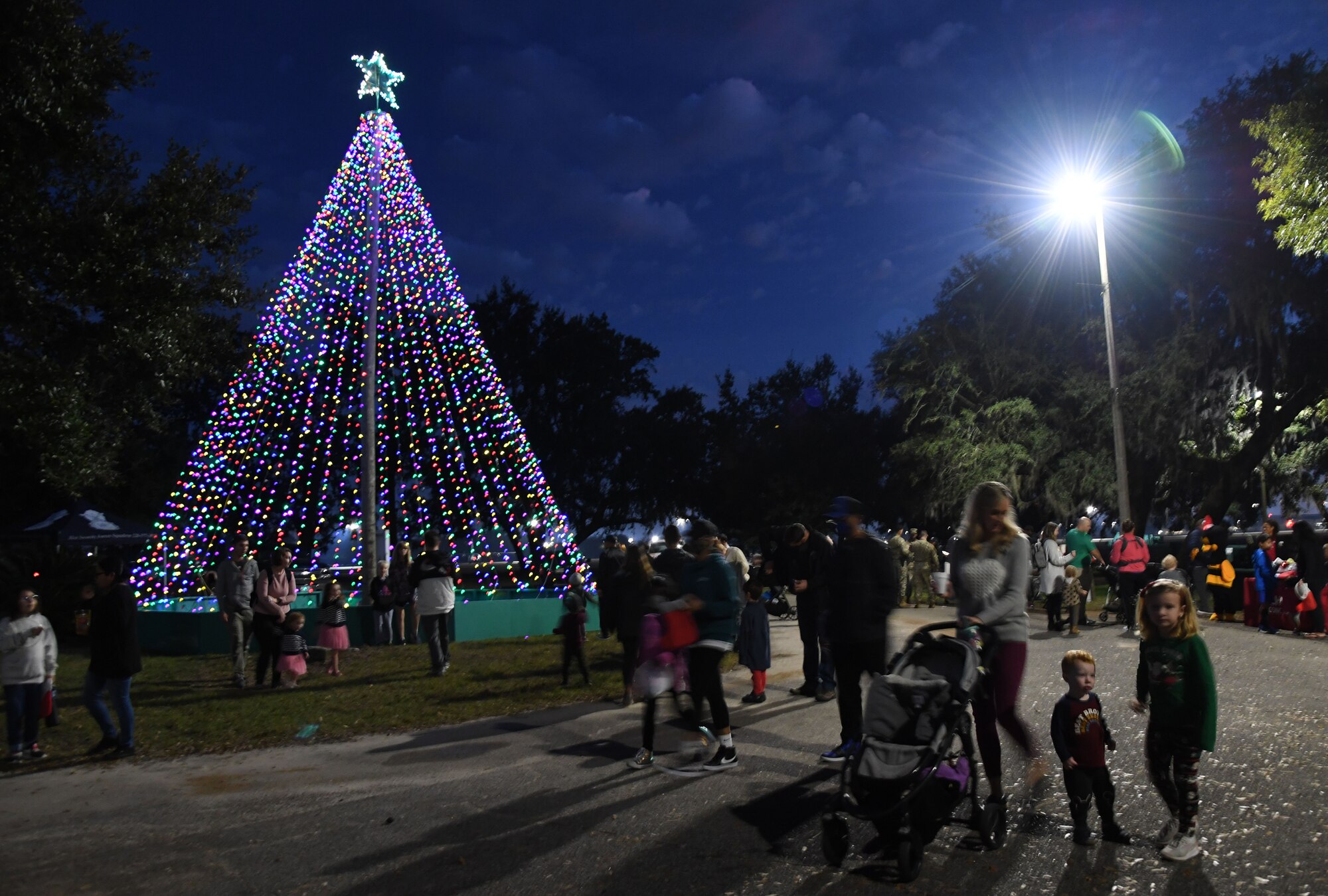 Keesler families attend the 2021 Winter Fest at the marina park on Keesler Air Force Base, Mississippi, Dec. 3, 2021. The event, which included a visit with Santa and a tree lighting ceremony, was held in celebration of the holiday season. (U.S. Air Force photo by Kemberly Groue)