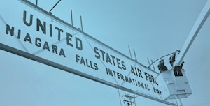 Airmen fix sign