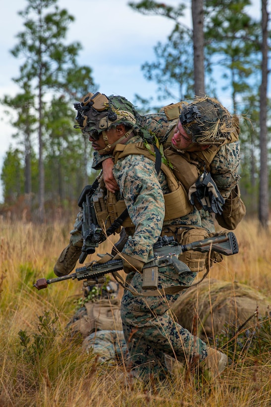 U.S Marine Corps Cpl. William Abelt, a rifleman with 3rd Battalion, 2d Marine Regiment, 2d Marine Division, carries a casualty during a mass casualty drill as part of a Marine Corps Combat Readiness Evaluation (MCCRE) on Camp Lejeune, N.C., Dec. 4, 2021. A MCCRE is an exercise designed to formally evaluate a unit’s combat readiness and if successful, the unit will achieve apex status and is deemed ready for global deployment. (U.S. Marine Corps photo by Lance Cpl. Ryan Ramsammy)