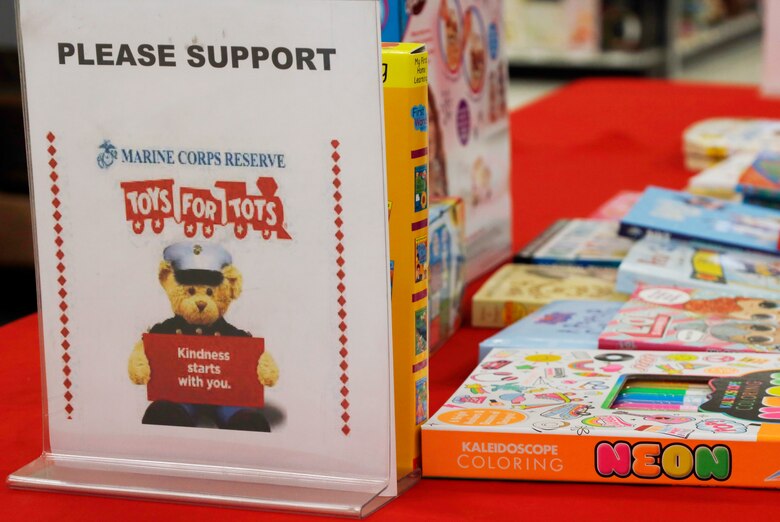 Several Toys for Tots donation boxes are located in the check-out area in the Marine Corps Exchange at Marine Corps Air Station Cherry Point, North Carolina, Nov. 23, 2021.
