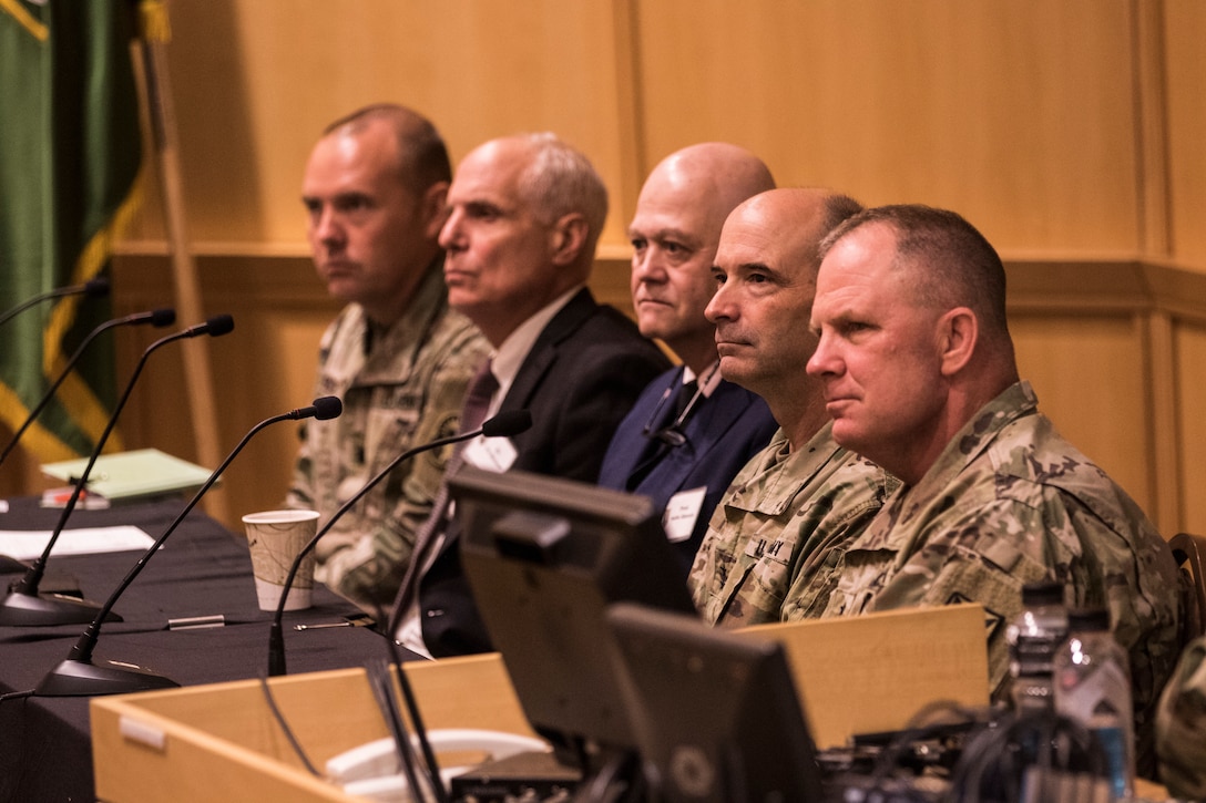 Speakers along with the host and commanding general of the 200th Military Police Command, Maj. Gen. John Hussey (right), sit as a panel answering questions on the importance of the relationship between the media and detainee operations during the Detainee Operations Training Event in Southbridge, Massachusetts.  The 200th Military Police Command hosted the event inviting keynote speakers discussing  past detainee operations and the opportunity to train Soldiers on future missions in detainee operations.