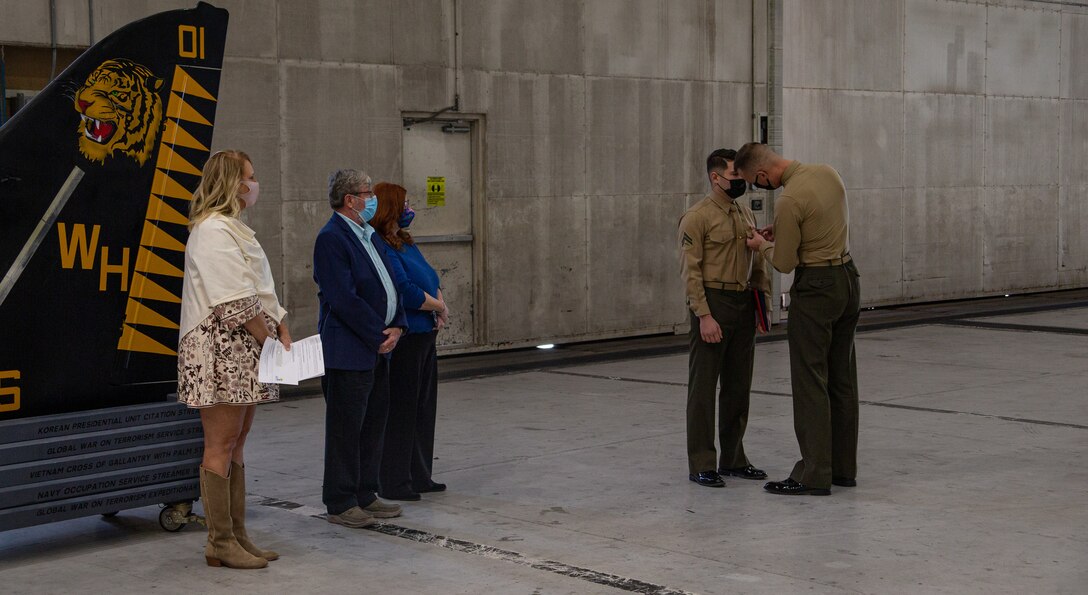 The Carteret County Chamber of Commerce Military Affairs Committee (MAC) celebrated U.S. Marine Corps Cpl. Ian MacDonald as the Service Person of the Quarter during a ceremony at Marine Corps Air Station Cherry Point, North Carolina, Nov. 19, 2021.