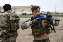 Senior Airman Lincoln Manor, 91st MSOS Tactics Response Force (TRF) trainer, prepares for the Global Strike Challenge at Minot Air Force Base, N.D., Aug 27, 2021. TRF conduct multiple exercises in preperation of the Global Strike Challenge. (U.S. Air Force photos by Senior Airman Dillon J. Audit)