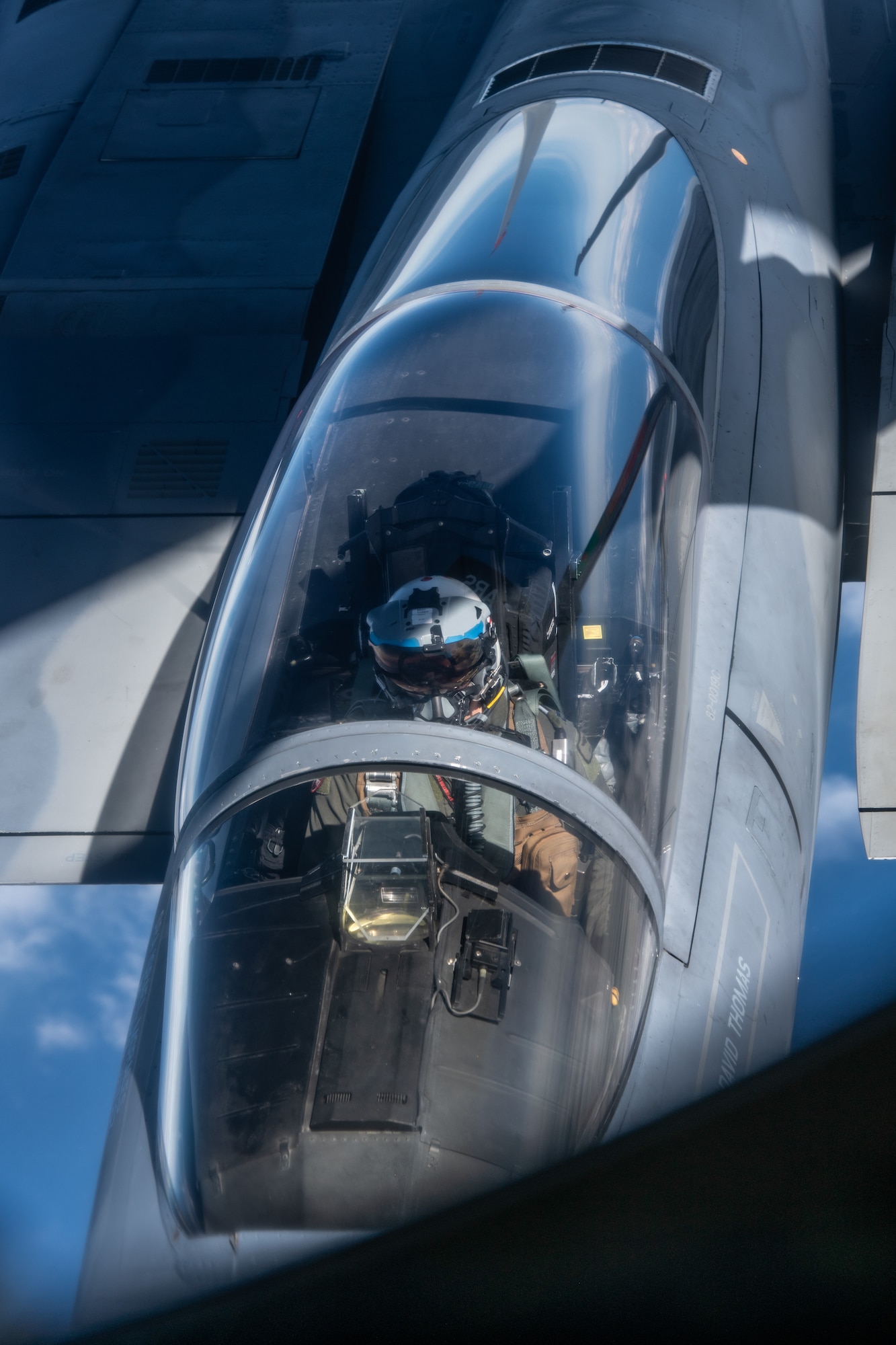 A fighter pilot gets refueled by KC-135 Stratotanker