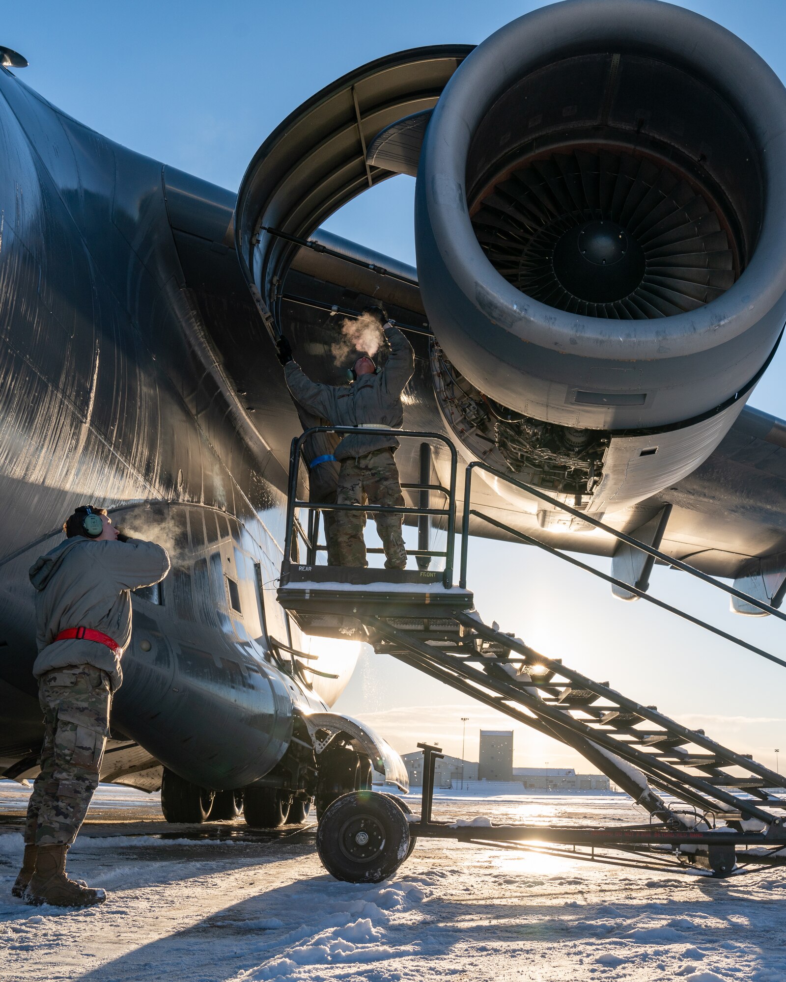 U.S. Air Force Airmen troubleshoot a maintenance issue on a C-17 Globemaster III.
