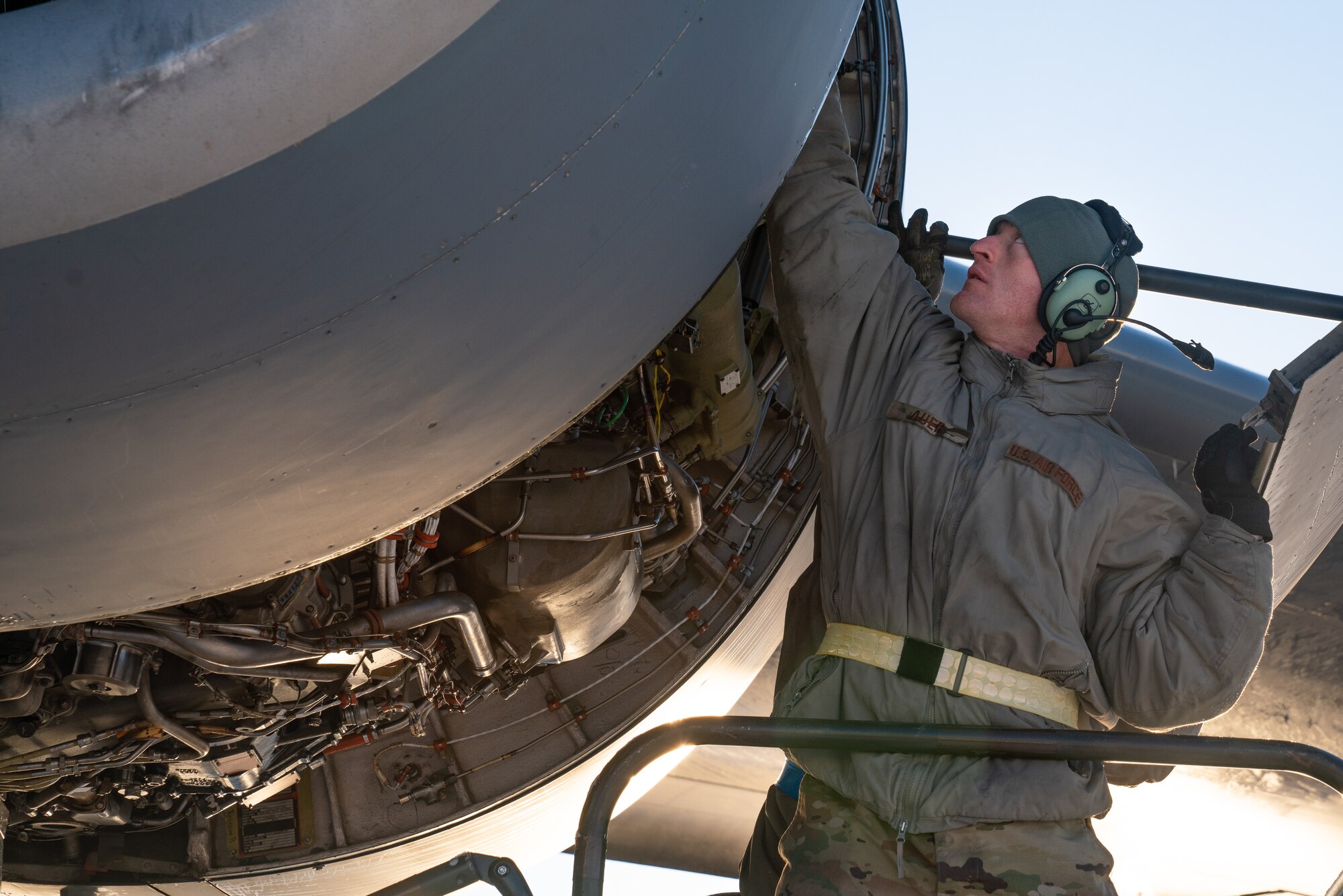 U.S. Air Force Staff Sgt. Matthew Auer, a 176th Maintenance Squadron maintainer, troubleshoots a maintenance issue on a C-17 Globemaster III.