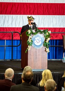 Adm. Daryl Caudle, commander, U.S. Fleet Forces Command (USFFC) delivers his personal remarks after relieving Adm. Christopher W. Grady, not shown, during the USFFC change of command ceremony aboard USS George H. W. Bush (CVN 77), Dec. 7, 2021.