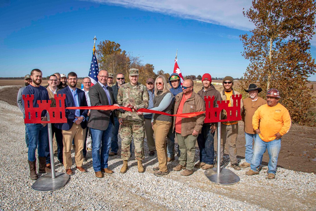 IN THE PHOTO, District Commander Col. Zachary Miller, district leadership, and the project delivery team met with the project partner, Eight Mile Drainage District of Greene County, in Arkansas, for a ribbon-cutting to celebrate a levee culvert and erosion repair project. (USACE Photo by Vance Harris)