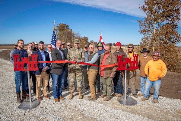 IN THE PHOTO, District Commander Col. Zachary Miller, district leadership, and the project delivery team met with the project partner, Eight Mile Drainage District of Greene County, in Arkansas, for a ribbon-cutting to celebrate a levee culvert and erosion repair project. (USACE Photo by Vance Harris)