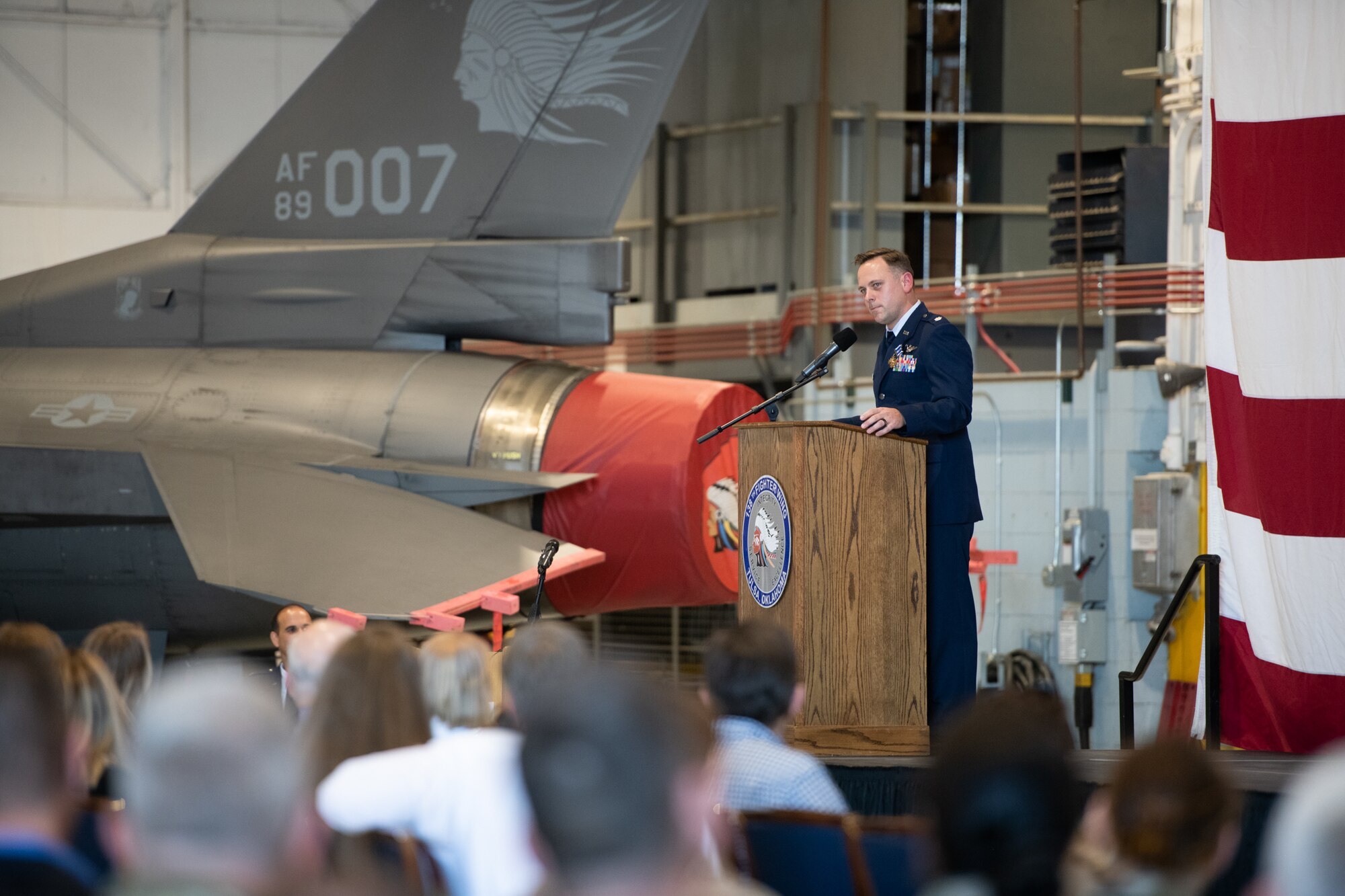 Lt. Col. Michael Coloney, 125th Fighter Squadron director of operations, speaks during a ceremony at the Tulsa Air National Guard Base, Okla., Dec. 5, 2021. Coloney was awarded the Distinguished Flying Cross for his heroism during a mission over Afghanistan in 2018. (Oklahoma Air National Guard Photo by Tech. Sgt. Rebecca Imwalle)