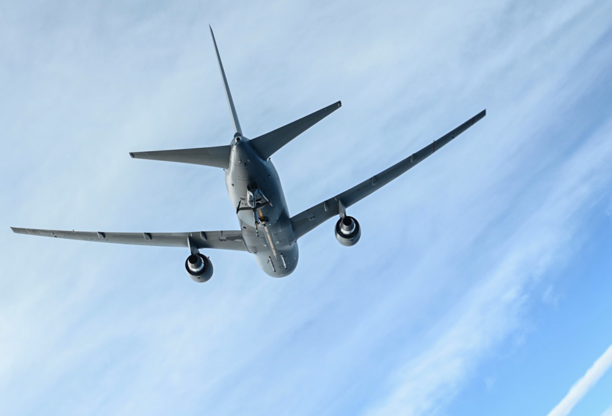 A KC-46 Pegasus assigned to Joint Base McGuire-Dix-Lakehurst, New Jersey prepares for air refueling during the first mission over the North Atlantic Ocean, Dec. 2, 2021. The KC-46 maintains air refueling edge through the use of both the refueling boom and drogue systems, allowing for simultaneous air refueling of multiple aircraft with wing pods. The KC-46 is designed to refuel allied and coalition aircraft and provide multifunctional support, like passenger and cargo transport along with medical and humanitarian relief. (U.S. Air Force photo by Senior Airman Ariel Owings)