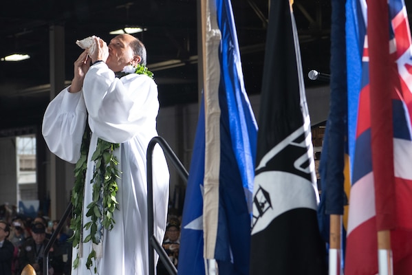 PEARL HARBOR, Hawaii (Dec. 7, 2021) Kahu, or Hawaiian pastor, Kordell Kekoa performs a Hawaiian blessing at the 80th Anniversary Pearl Harbor Remembrance. Dec. 7, 2021, marks the 80th anniversary of the attacks on Pearl Harbor and Oahu. The U.S. military, State of Hawaii and National Park Service are hosting a series of remembrance events throughout the week to honor the courage and sacrifices of those who served throughout the Pacific Theater. Today, the U.S.-Japan Alliance is a cornerstone of peace and security in a free and open Indo-Pacific region. (U.S. Navy photo by Mass Communication Specialist 1st Class Jessica Gray)