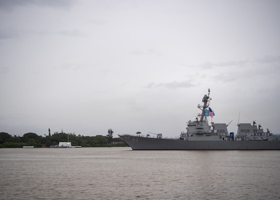 PEARL HARBOR, Hawaii (Dec. 7, 2021) Sailors aboard Arleigh Burke-class guided-missile destroyer USS Chung Hoon (DDG 93) render honors while passing the USS Arizona Memorial as part of the 80th Anniversary Pearl Harbor Remembrance. Dec. 7, 2021, marks the 80th anniversary of the attacks on Pearl Harbor and Oahu. The U.S. military, State of Hawaii and National Park Service are hosting a series of remembrance events throughout the week to honor the courage and sacrifices of those who served throughout the Pacific Theater. Today, the U.S.-Japan Alliance is a cornerstone of peace and security in a free and open Indo-Pacific region. (U.S. Navy photo by Mass Communication Specialist 2nd Class Nick Bauer)