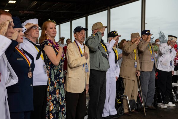 PEARL HARBOR, Hawaii (Dec. 7, 2021) Pearl Harbor survivors and World War II veterans, along with family and friends, render honors at the 80th Anniversary Pearl Harbor Remembrance. Dec. 7, 2021 marks the 80th anniversary of the attacks on Pearl Harbor and Oahu. The U.S. military, State of Hawaii and National Park Service are hosting a series of remembrance events throughout the week to honor the courage and sacrifices of those who served throughout the Pacific theater. Today, the U.S.-Japan Alliance is a cornerstone of peace and security in a free and open Indo-Pacific region. (U.S. Navy photo by Mass Communication Specialist 1st Class Kelby Sanders)