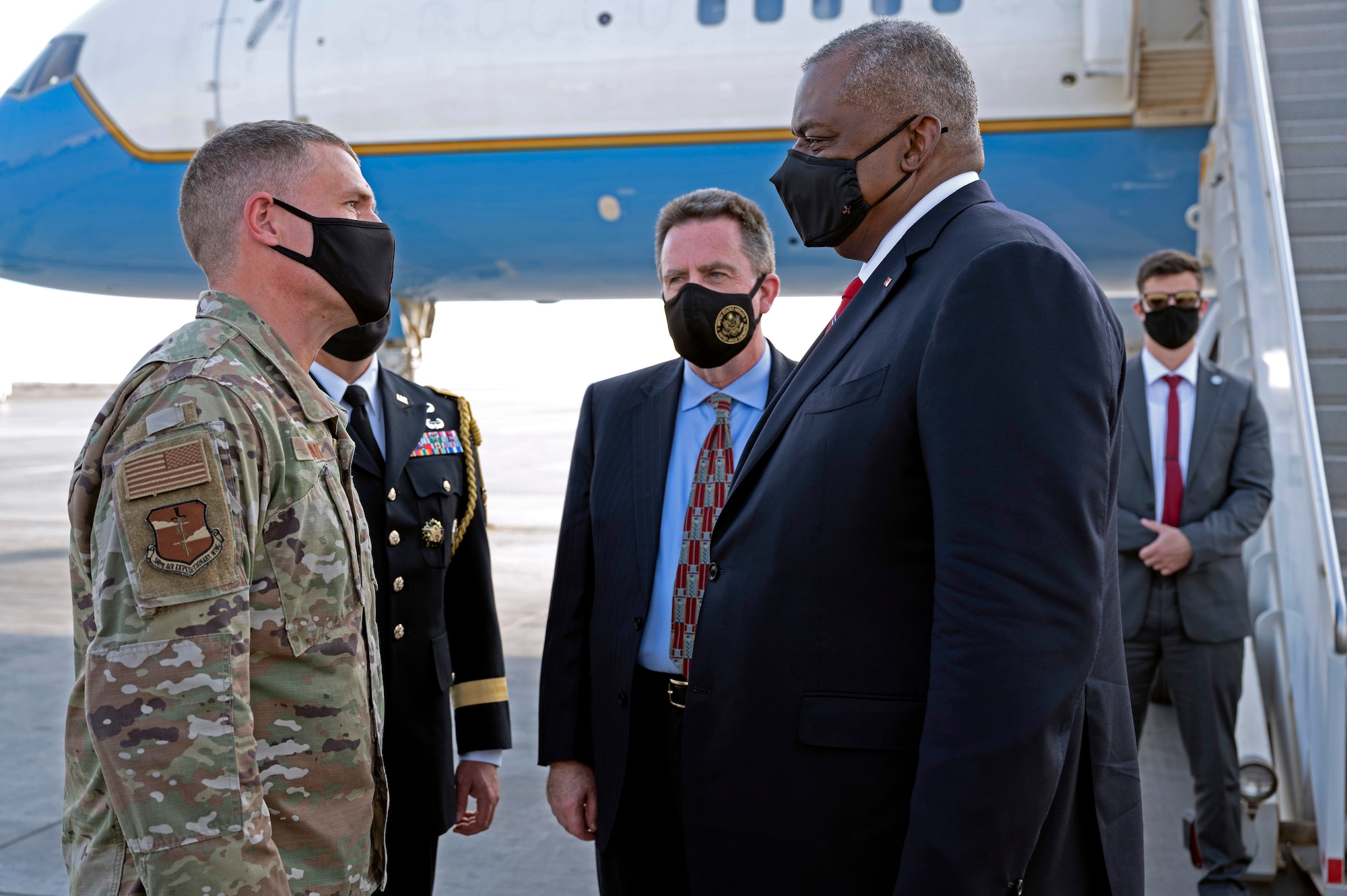 Secretary of Defense Lloyd J. Austin III speaks with U.S. Air Force Brig. Gen. Andrew M. Clark, 380th Air Expeditionary Wing commander, at Al Dhafra Air Base, United Arab Emirates, Nov. 22, 2021. Austin Traveled to the UAE to meet with senior government officials to reaffirm the US-UAE strategic partnership.