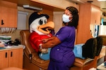 Norfolk Naval Shipyard’s mascot, Yardbird Sam, participates in a recent blood drive at the shipyard.