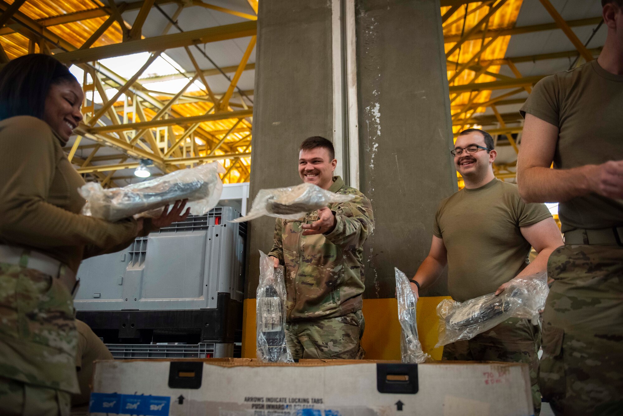 A man throws a package.