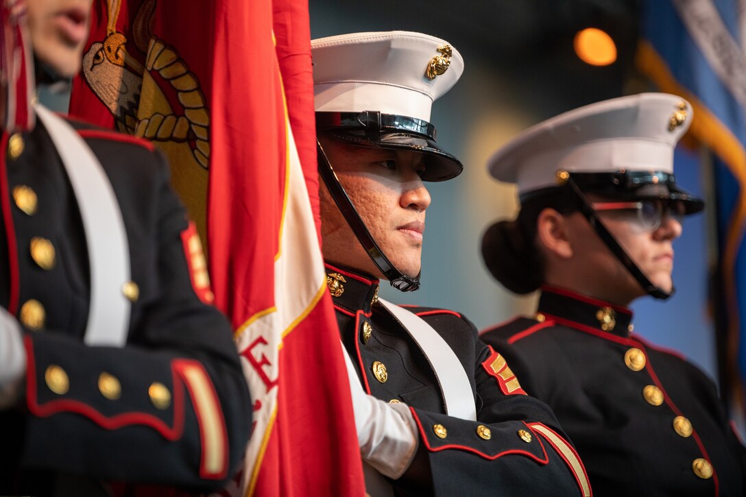 The Marine Forces Reserve color guard parade the colors during an 80th anniversary Pearl Harbor remembrance ceremony at the National World War II Museum in New Orleans Dec. 7, 2021. Civilians, veterans and service members came together to honor those who perished during the attack on Dec. 7, 1941 and to thank the service members who would subsequently fight during WWII. (U.S. Marine Corps photo by Cpl. Jonathan L. Gonzalez)