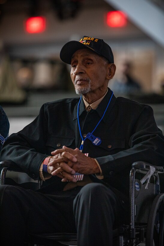 Leonard Larkins, a WWII veteran from Southern Louisiana, attends a commemorative ceremony for the 80th anniversary of the attack on Pearl Harbor at the National World War II Museum in New Orleans Dec. 7, 2021. Civilians, veterans and service members came together to honor those who perished during the attack on Dec. 7, 1941 and to thank the veterans who would subsequently serve during WWII. (U.S. Marine Corps photo by Cpl. Jonathan L. Gonzalez)
