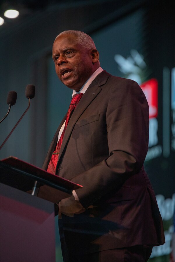 Michael Ward, son of WWII veteran of Pearl Harbor and Guadalcanal, retired Petty Officer 1st Class Harold Ward, speaks during a commemorative ceremony of the 80th anniversary of the attack on Pearl Harbor at the National World War II Museum in New Orleans Dec. 7, 2021. Civilians, veterans and service members came together to honor those who perished during the attack on Dec. 7, 1941 and to thank the service members who would subsequently fight during WWII. Reserve Marines played a pivotal role in the Marine Corps' success in the Pacific, making up 70 percent of Marines who served during WWII. (U.S. Marine Corps photo by Cpl. Jonathan L. Gonzalez)