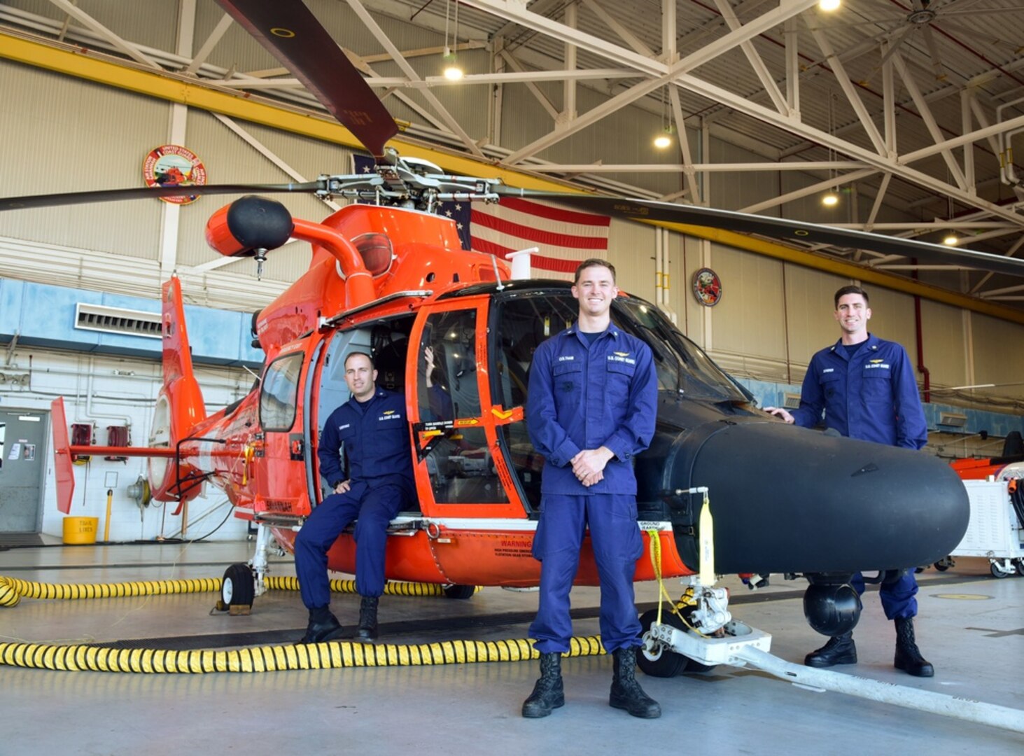 U.S. Coast Guard Petty Officer 3rd Class Schuyler Chervinko (left), Petty Officer 3rd Class Forrest Coltham (center), both aviation maintenance technicians, and Petty Officer 2nd Class Doug Scherer, an avionics electrical technician, are the newest members of the Coast Guard's reserve aviation workforce program and began their reserve duty at Coast Guard Air Station Savannah, Georgia, Oct. 16, 2021. The program currently allows enlisted members in the aviation career field separating from active duty the opportunity to transfer into the reserves. (U.S. Coast Guard photo by Petty Officer 2nd Class Barry Bena)