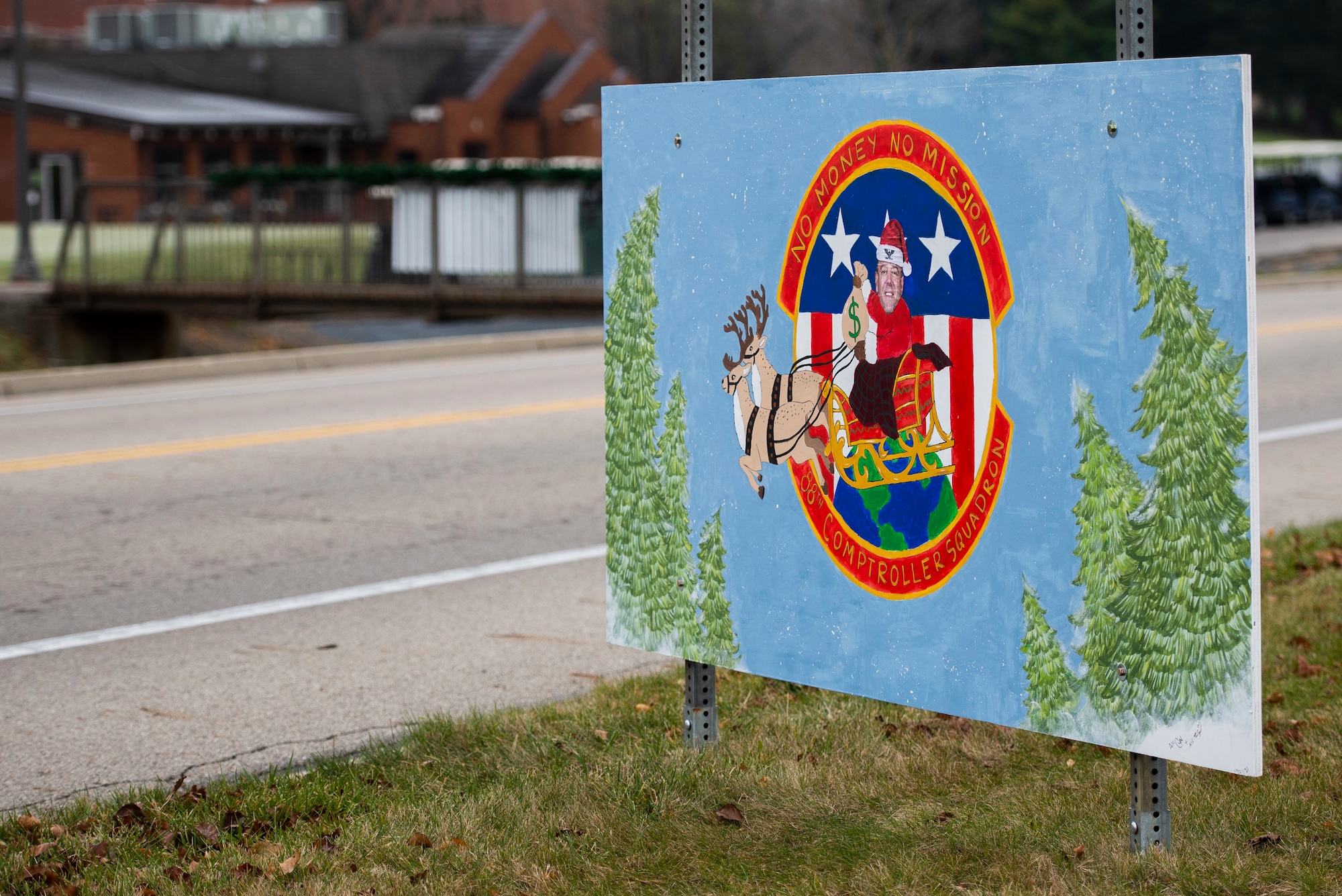Giant Christmas cards designed by base organizations line Skeel Ave on Wright-Patterson Air Force Base, Ohio. The cards were an attempt to keep people socially connected during COVID-19. (U.S. Air Force photo by Wesley Farnsworth)