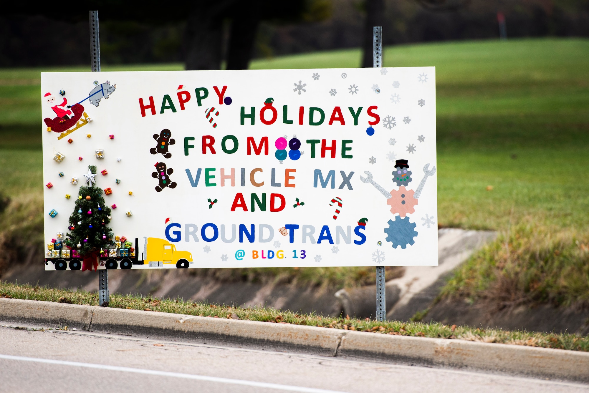 Giant Christmas cards designed by base organizations line Skeel Ave on Wright-Patterson Air Force Base, Ohio. The cards were an attempt to keep people socially connected during COVID-19. (U.S. Air Force photo by Wesley Farnsworth)